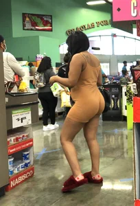 Latina with hard nipples and a big booty in tight spandex shorts outfit