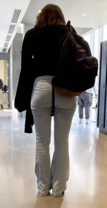Nicely shaped college girl ass in blue pants