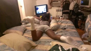 Black sexy girlfriend laying around in little shorts