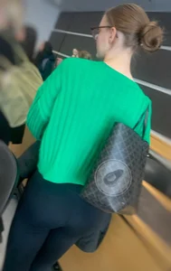 College Girl in Green Sweater and Leggings
