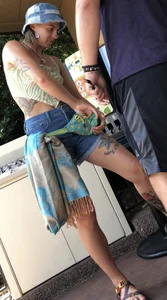 Tatted up hippie in short jean shorts with a nip slip