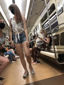 Cute And Slightly Awkward Tall Teen Girl in a Top and Denim Shorts Subway Train Candid Photos