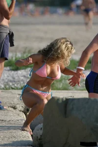 Beach voyeur girls in bikinis, thongs and topless
