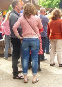 Girls in tight blue jeans on the street creepshots