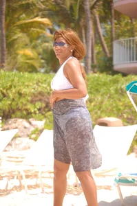Bunch of sexy girls and milfs in bikinis at the beach