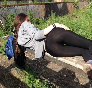 Skinny Teen JB Lying on Bench in Yoga Pants Sexy Candid