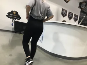 Sexy Amazon employee in leggings with a nice ass