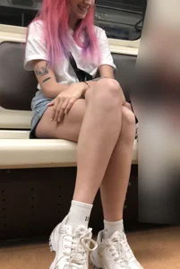 Girl With Pink Hair and Hot Legs in Denim Shorts in the Subway Train Candid Photo Gallery