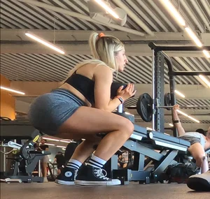 Cute gym blonde with orange hair ribbon