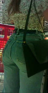 Sexy girl grocery shopping in jean with a nice ass