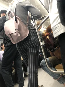 Sexy Booty in Striped Pants Subway Train Creepshot
