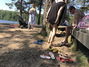 Candid Girl Putting On Swimsuit and Undressing at the Forest Lake Beach Gallery