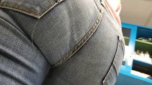 Girl with a nice ass in tight jeans and vpl up close