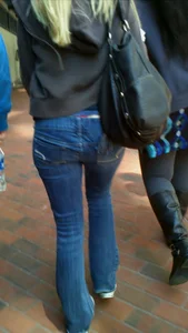 Blonde in tight jeans with her red thong sticking out