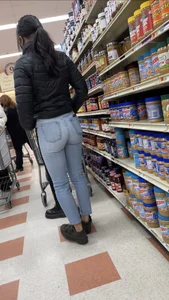 Sexy Asian girl grocery shopping in tight jeans with a nice ass