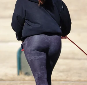 Ass in Purple Leggings