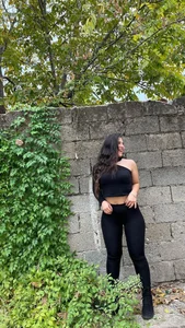 Hot Girl in a Top And Leggings Street Photos