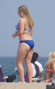 3 girls on the beach in bikinis with big boobs, one brunette and two blondes