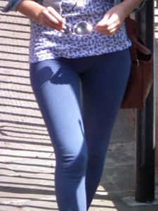 Hot blonde girl in tight blue leggings with nice ass