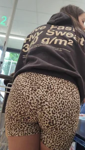 Thick brunette in short leggings and company