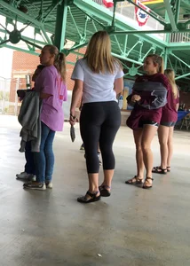 Big booty babe at a baseball game in tight leggings
