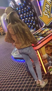 Skinny teens in the arcade