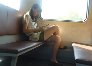Sexy girls in skirts, stockings and upskirts on the train