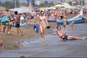 Girls on a nude beach in Bibione, Italy