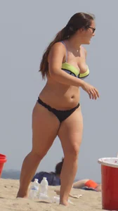 Thick girl on the beach in a bikini