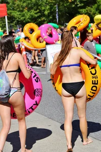 Beautiful and sexy tubing teen in bikini with a sexy friend