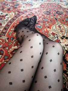 Legs in Black Pantyhose with Dots - Girl Sitting on the Floor Selfie Closeup