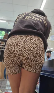 Thick brunette in short leggings and company