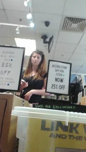 Girl at the record store in shorts with a nice booty and vpl