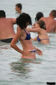 Beach voyeur girls in bikinis, thongs and topless