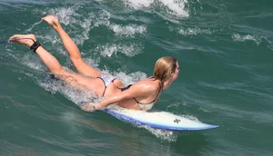 Candid surfer babes on the beach and in bikinis