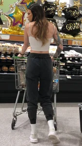 Tatted Fit slim brunette beauty at the market