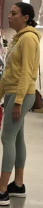 Brunette milf in light colored leggings