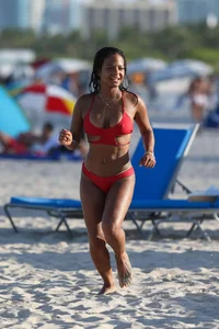 Christina Milian in red bikini in Miami with hard nipples