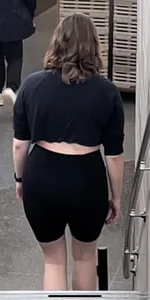 Girl in a top and spansex shorts with a big hot butt creepshots