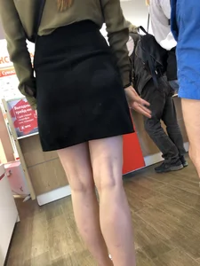 Girl with Pale Skinny Legs in a Skirt Candid