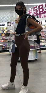 Slim latina in light brown leggings