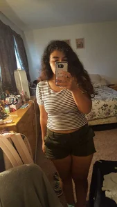 Chubby Bespectacled Girl Taking Selfies in Her Underwear