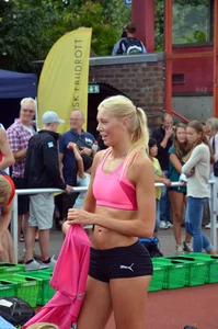 Sexy blonde track sprinter changing after a race