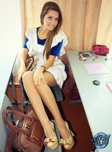 Teen in Hot Uniform with Hot Legs on High Heels in Classroom