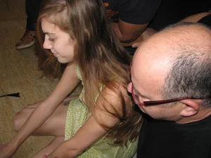 Young And Cute Girl in a Dress Sitting on the Floor Creepshot