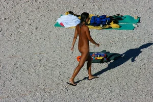 FKK Nudists playing in the water with floater