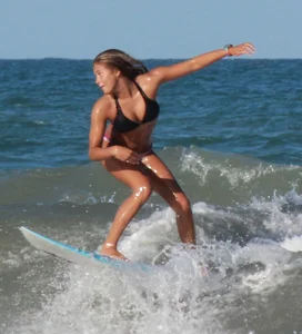 Hot surfer chicks out in the water