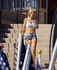 Sexy hot blonde in tight grey spandex shorts with amazing body