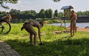 Hot Girl in Swimsuit Bending Over on the Riverbank Creepshot