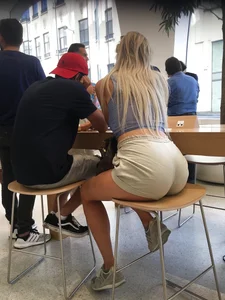 Blonde With Big Ass in Shorts at a Cafe Creepshot